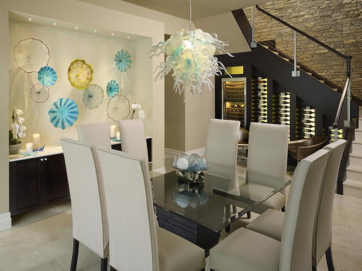 a kitchen with a large table and chairs in a southern american home